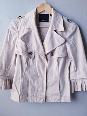 Carlisle cream trench coat with ruffle details size small